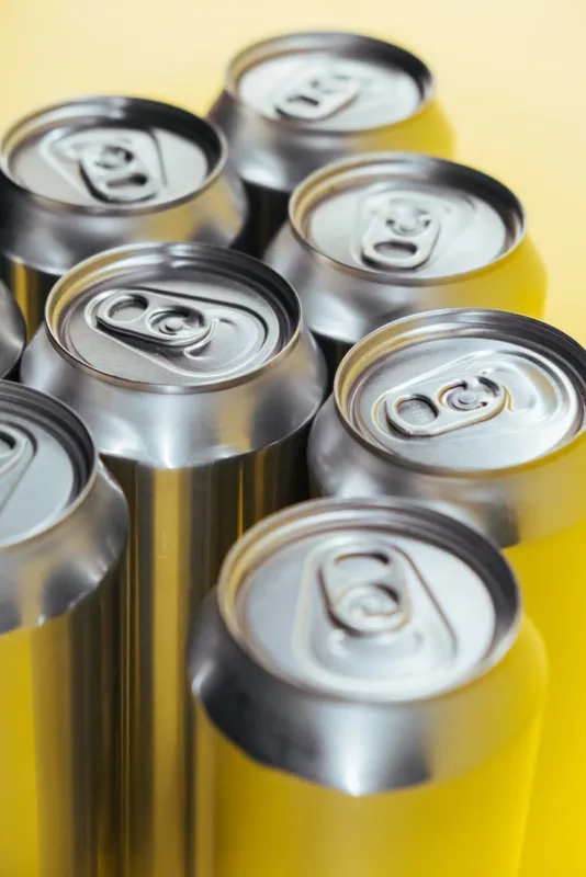 silver cans in close up photography